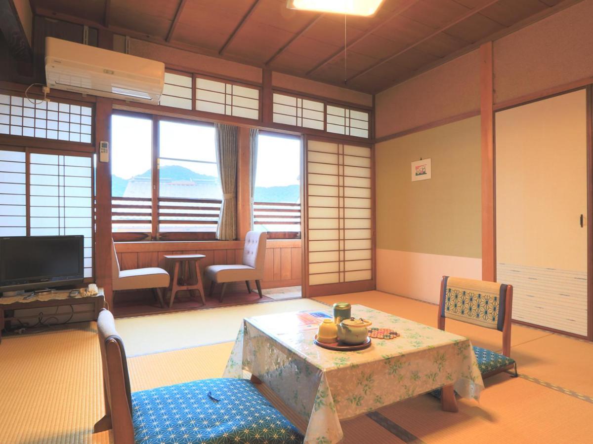 Ougiya Ryokan Toyooka  Bagian luar foto